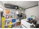 Image shows a storage area with lots of items stored on shelves, and a washing machine at 513 Kelsey St # 513, Lakeland, FL 33803