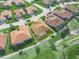 Aerial view of property highlighting its location on the golf course and screened patio at 5268 Pebble Beach Blvd, Winter Haven, FL 33884