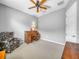 Comfortable home office with ceiling fan, carpet, and a large window at 5268 Pebble Beach Blvd, Winter Haven, FL 33884