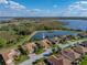 Single-Gathering home with barrel tile roof in a community with water views at 5357 Hogan Ln, Winter Haven, FL 33884