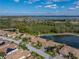 Single-Gathering home with barrel tile roof in a community with water views at 5357 Hogan Ln, Winter Haven, FL 33884