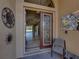 Welcoming foyer showcasing tile flooring and a glimpse into the home's living space at 5357 Hogan Ln, Winter Haven, FL 33884