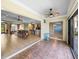 Open concept floor plan allows seamless transition from living room to kitchen and outdoor living spaces at 5357 Hogan Ln, Winter Haven, FL 33884
