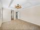 Large main bedroom with tile floors, trey ceiling, and ensuite access at 5357 Hogan Ln, Winter Haven, FL 33884