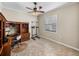 Home office features a ceiling fan, tile floors and natural light at 5357 Hogan Ln, Winter Haven, FL 33884