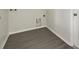 Clean laundry room with hard surface floors and washer/dryer hookups at 583 Drayton Rd, Winter Haven, FL 33884