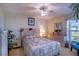 Relaxing bedroom with natural light and pleasant décor at 625 Hatchwood Dr, Haines City, FL 33844