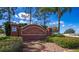 Hatchwood Estates entrance sign set amongst well-maintained landscaping at 625 Hatchwood Dr, Haines City, FL 33844