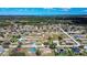 An aerial view of a neighborhood showcasing well-maintained homes at 625 Hatchwood Dr, Haines City, FL 33844