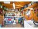 Well-equipped shed with workbench, tool storage, and garden equipment at 625 Hatchwood Dr, Haines City, FL 33844