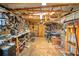 Functional workshop featuring workbenches, tools, and ample workspace at 625 Hatchwood Dr, Haines City, FL 33844