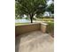 This patio is a blank canvas for your outdoor living dreams with views of the water beyond at 703 Eagle Pond Dr # 703, Winter Haven, FL 33884