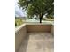 Cozy patio overlooking a tranquil lake view, perfect for relaxing outdoors at 703 Eagle Pond Dr # 703, Winter Haven, FL 33884
