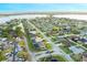 Desirable neighborhood with beautiful homes and a tranquil lake providing scenic views and community charm at 7327 Bent Grass Dr, Winter Haven, FL 33884