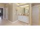Bathroom with a white vanity, granite countertop, and a glass shower at 7327 Bent Grass Dr, Winter Haven, FL 33884