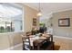 Inviting dining area with natural light and seating for six at 7327 Bent Grass Dr, Winter Haven, FL 33884