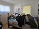 Bedroom featuring hardwood floors and a window with blinds at 915 Exmoor Way, Lake Wales, FL 33853