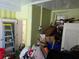 An interior of a cluttered storage room area in need of some cleaning and organizing at 915 Exmoor Way, Lake Wales, FL 33853
