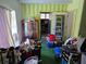 Room featuring green striped wallpaper and clutter and a ladder at 915 Exmoor Way, Lake Wales, FL 33853