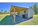View of the outbuilding lean-to showing storage area at 990 Brooke Rd, Fort Meade, FL 33841