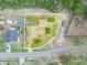 Aerial view of the property showcasing the backyard and pool area at 100 Heatherwood Blvd, Lake Wales, FL 33859