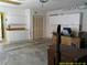 Spacious garage with ample storage cabinets and room for projects at 100 Heatherwood Blvd, Lake Wales, FL 33859