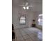 This cozy living room offers a comfortable seating area and natural light at 100 Heatherwood Blvd, Lake Wales, FL 33859