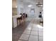Bright and airy living room area with tile flooring and natural light at 100 Heatherwood Blvd, Lake Wales, FL 33859