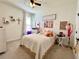 Bedroom showcasing a cozy interior, decor, ceiling fan, and lots of natural light at 1055 Lena Run Ct, Winter Haven, FL 33880