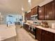 Beautiful kitchen featuring stainless steel appliances, and plenty of cabinet space at 1055 Lena Run Ct, Winter Haven, FL 33880