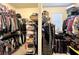 Organized walk-in closet with ample hanging space and shelving at 1055 Lena Run Ct, Winter Haven, FL 33880