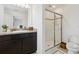 Bathroom with a walk-in shower, granite countertop and vanity at 141 Claire Ln, Davenport, FL 33837