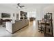 Comfortable living room with open access to the kitchen at 141 Claire Ln, Davenport, FL 33837