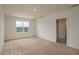 Large, empty bedroom with natural light, and carpet flooring at 2005 Carnostie Rd, Winter Haven, FL 33884