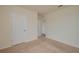 Bedroom featuring neutral walls, carpeted floors, and closet at 2005 Carnostie Rd, Winter Haven, FL 33884