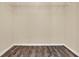 This walk-in closet features built-in wire shelving and wood flooring at 208 Lake Region S Blvd, Winter Haven, FL 33881