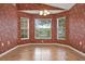 Breakfast nook with large windows providing natural light and backyard views at 208 Lake Region S Blvd, Winter Haven, FL 33881