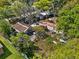Aerial view showing house needing major repairs and attention at 215 10Th Wahneta W St, Winter Haven, FL 33880