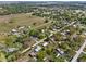 Sprawling community with homes nestled amongst mature trees and lush green landscapes, offering a serene and picturesque setting at 215 10Th Wahneta W St, Winter Haven, FL 33880
