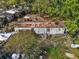 Exterior view featuring a home requiring significant maintenance and clean up at 215 10Th Wahneta W St, Winter Haven, FL 33880