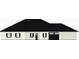 Traditional home showcasing a black roof, neutral siding, and a coordinated garage door and shutters at 2220 2Nd St, Mulberry, FL 33860