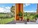 A relaxing balcony space with seating, plants, and a scenic view of the surrounding landscape at 2300 N Scenic Hwy # 56, Lake Wales, FL 33898