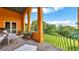 Cozy balcony provides comfortable seating and a scenic view of the lush outdoors at 2300 N Scenic Hwy # 56, Lake Wales, FL 33898