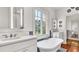 Bathroom with soaking tub and tile accents at 2300 N Scenic Hwy # 56, Lake Wales, FL 33898
