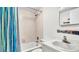 Bright bathroom with a tub, shower, and white fixtures at 2300 N Scenic Hwy # 56, Lake Wales, FL 33898