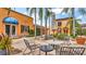 Charming courtyard with outdoor seating and lush landscaping at 2300 N Scenic Hwy # 56, Lake Wales, FL 33898
