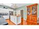 Charming kitchen featuring an island, butcher block top, and a classic wood display cabinet at 2300 N Scenic Hwy # 56, Lake Wales, FL 33898