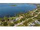 Breathtaking aerial view showcasing the lakefront homes and serene lakeside community at 2350 Crump Rd, Winter Haven, FL 33881