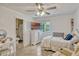Bedroom with ceiling fan and an ensuite bathroom at 2350 Crump Rd, Winter Haven, FL 33881