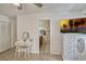 Bedroom with ceiling fan and an ensuite bathroom at 2350 Crump Rd, Winter Haven, FL 33881